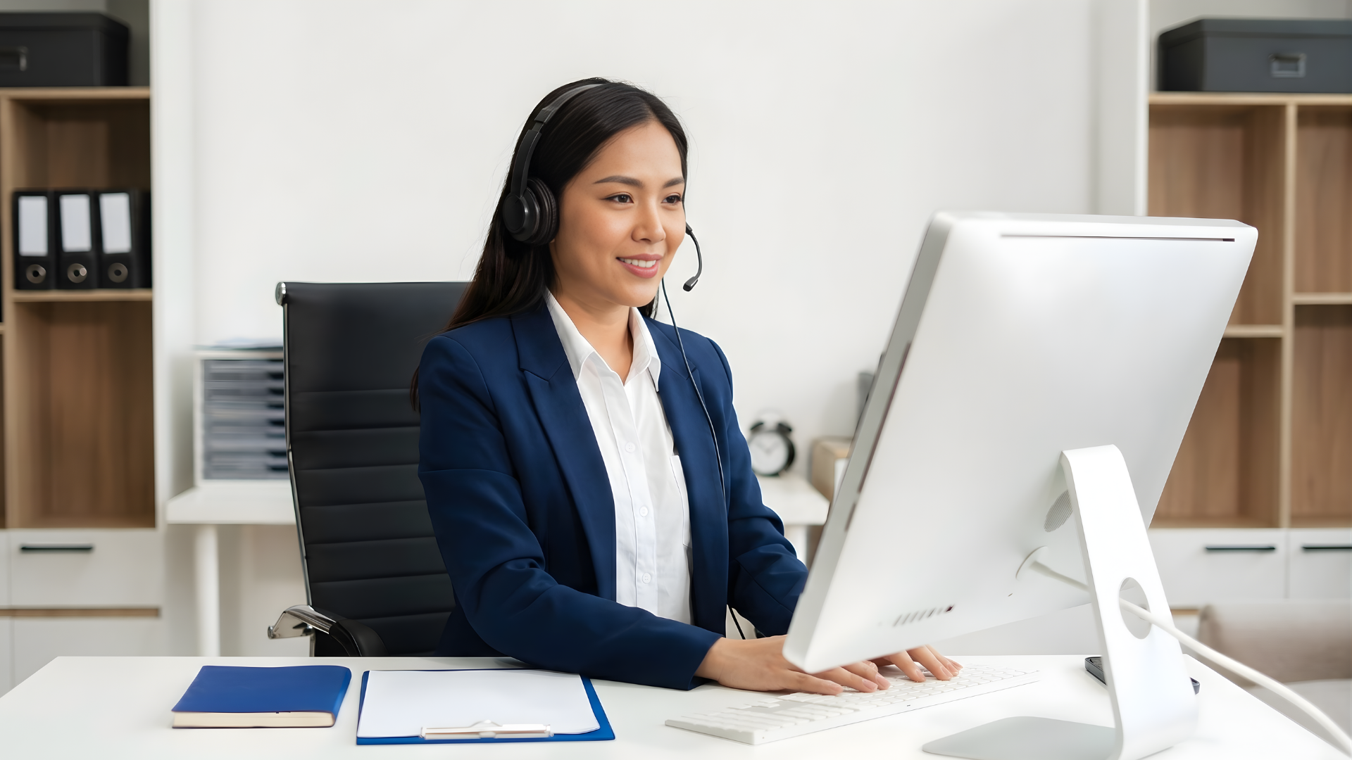 filipino remote contract administrator happy working in an administrative office